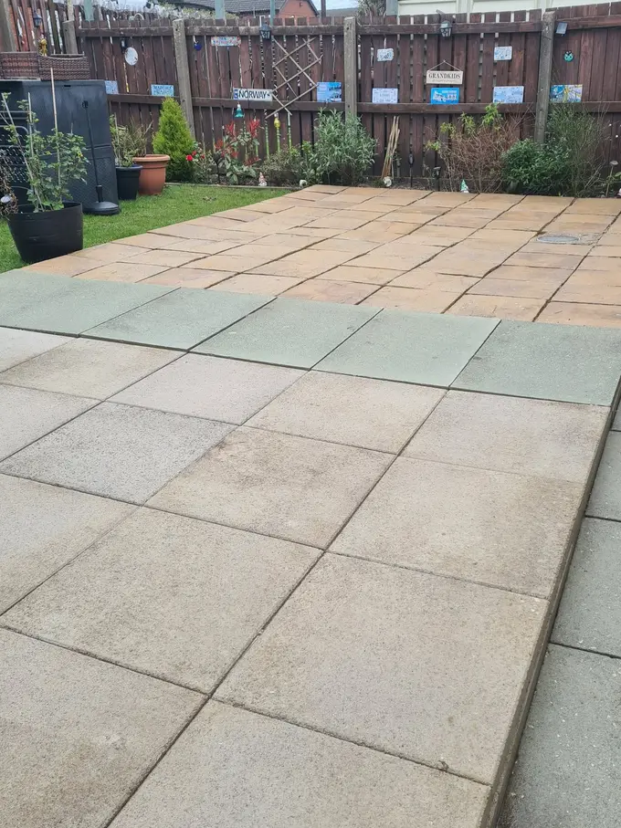 Grey sandstone patio washed back to its natural colour