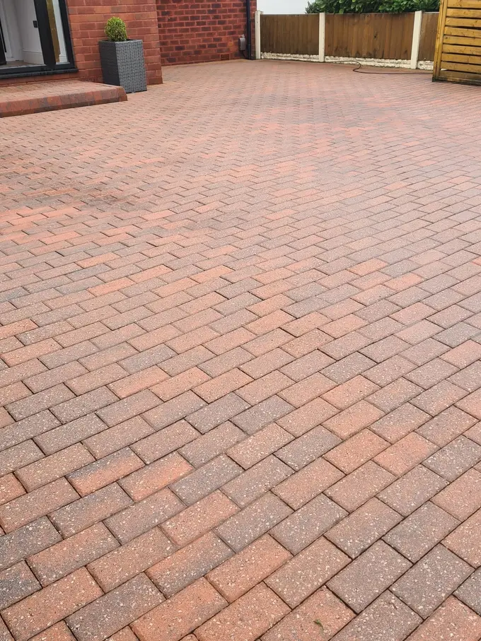 Large block paving driveway pressure washed clean of grime
