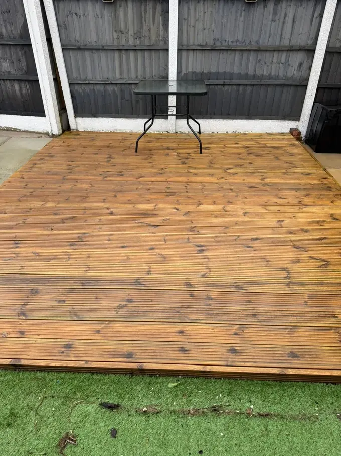 Timber garden decking cleaned back to bare wood