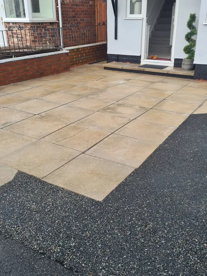 Tarmac driveway with a sandstone border cleaned