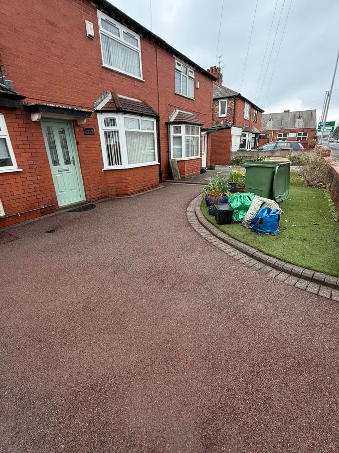 Red tarmac driveway cleaned back to a rich finish