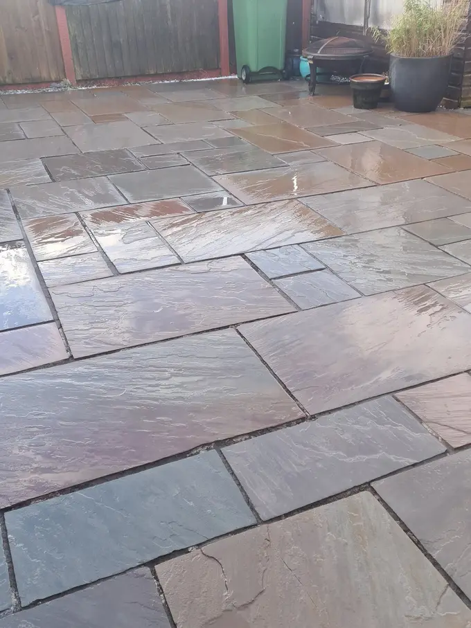 Indian sandstone patio jet washed back to its natural colour