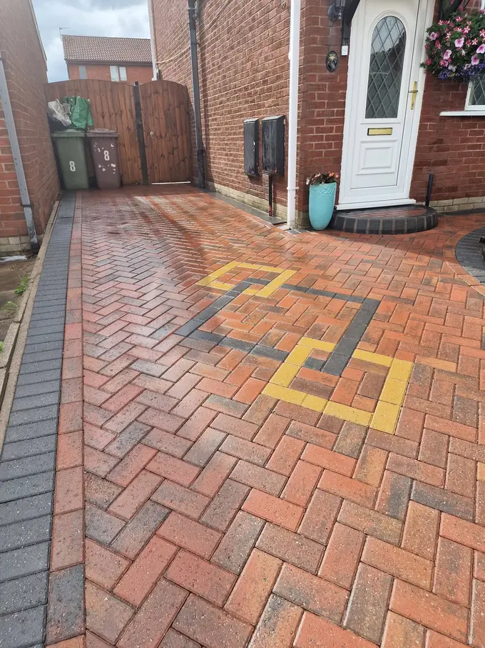 Block paving driveway cleaned back to a fresh finish