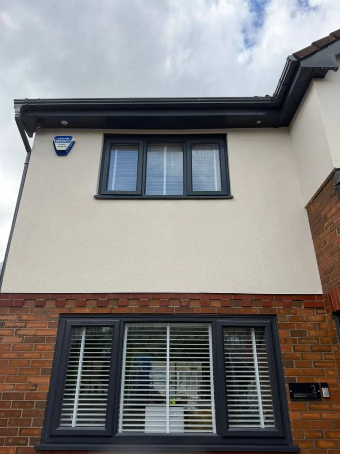 Modern render house front soft washed clean of dirt