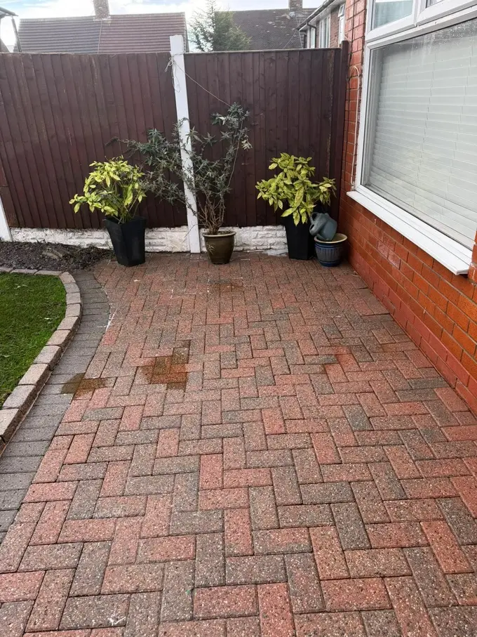 Block paved courtyard cleaned back to a fresh finish
