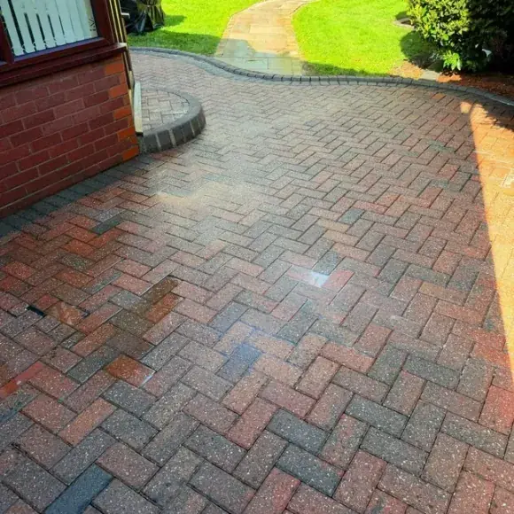 Herringbone block paving driveway cleaned