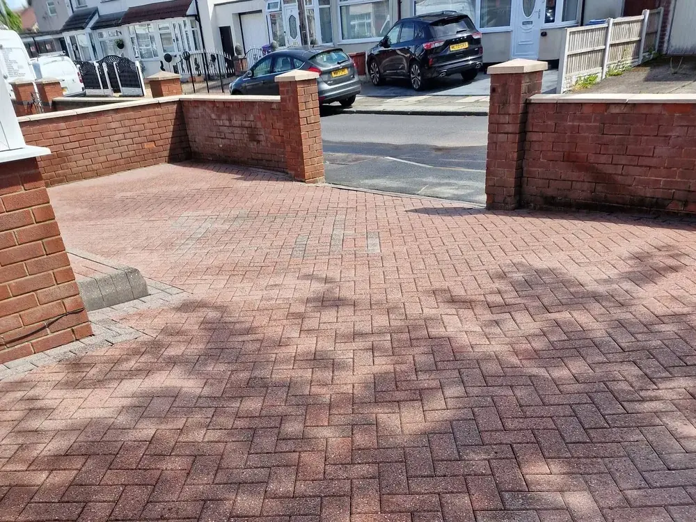 Red block paving driveway cleaned by Blastaway